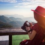 woman-viewing-photos-camera_335224-745